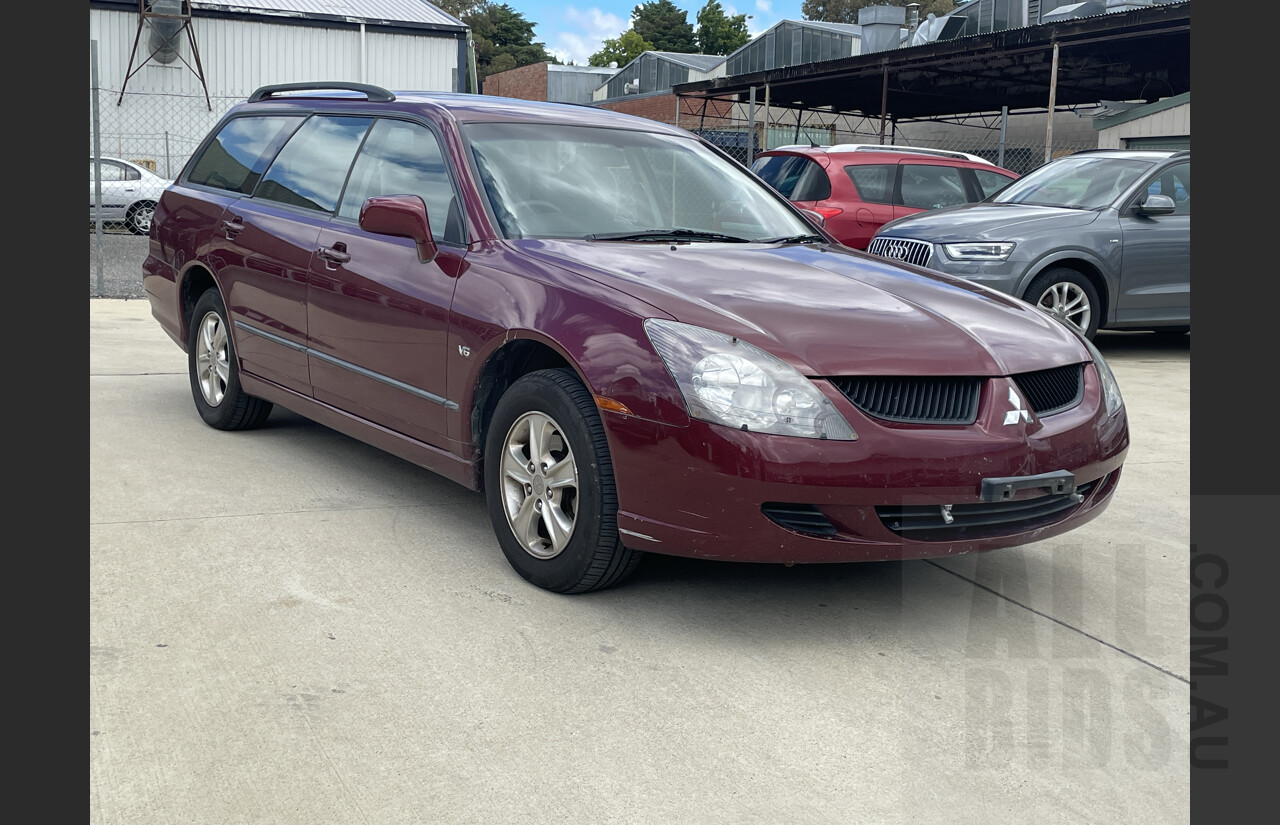 10 2004 Mitsubishi Magna LS TW Lot 1303299 CARBIDS