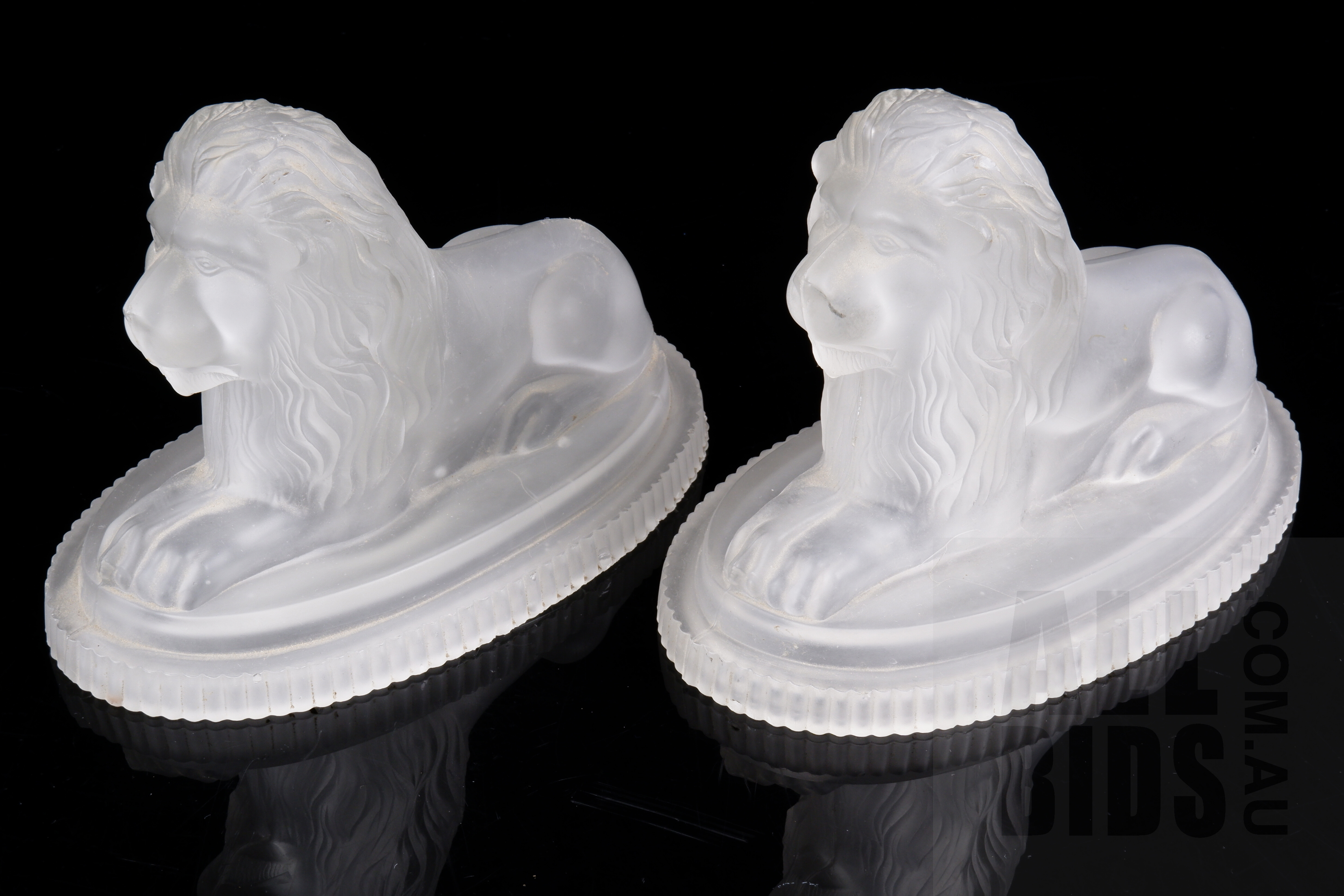 'Pair of Rare Victorian Lion After Landseer Moulded Glass Large Paperweights Manufactured by John Derbyshire of Manchester, Circa 1874'