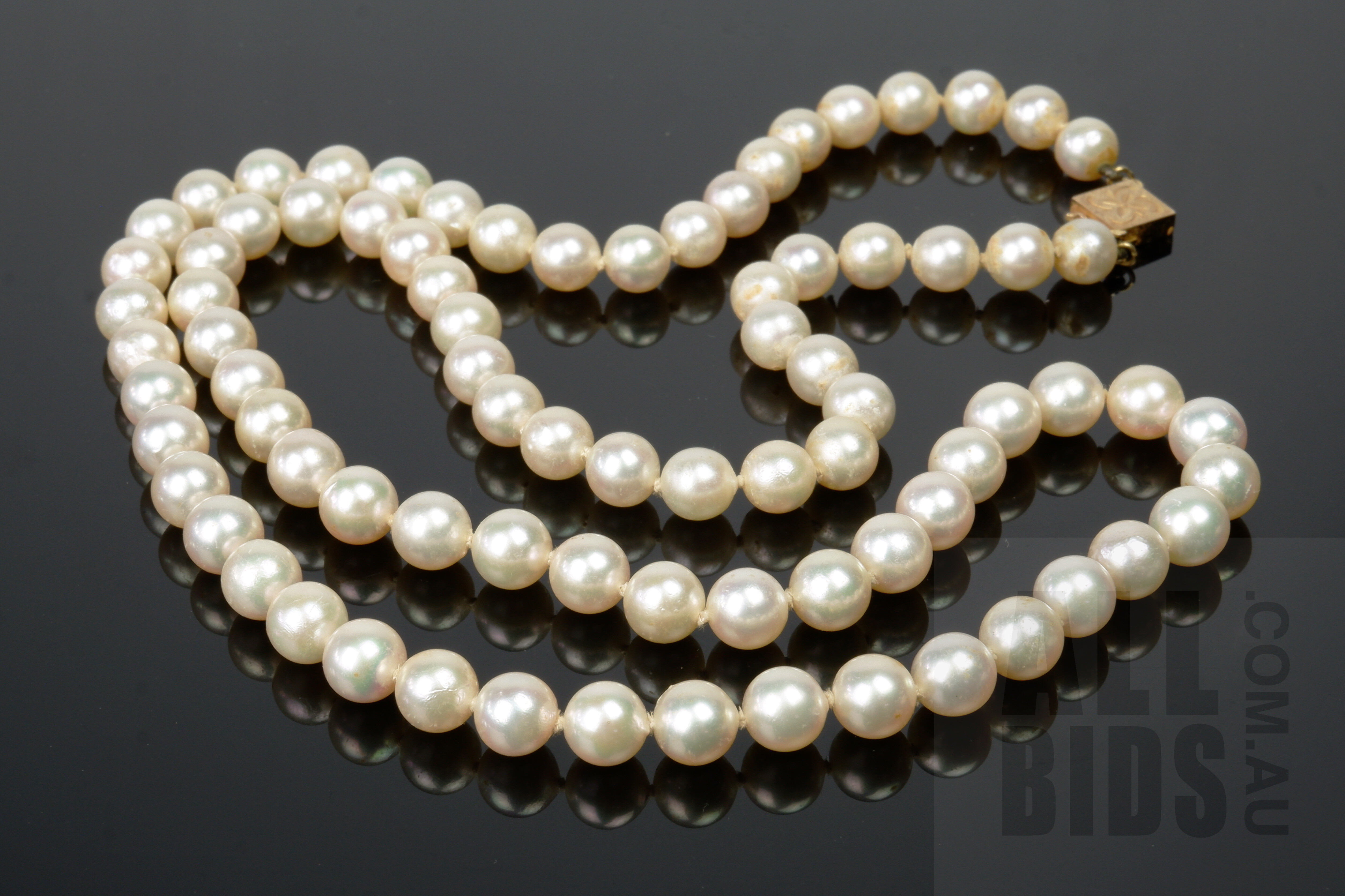 'Strand of Akoya Type Cultured Pearls with 14ct Yellow Gold Clasp, Creamy White 6.5-7mm'