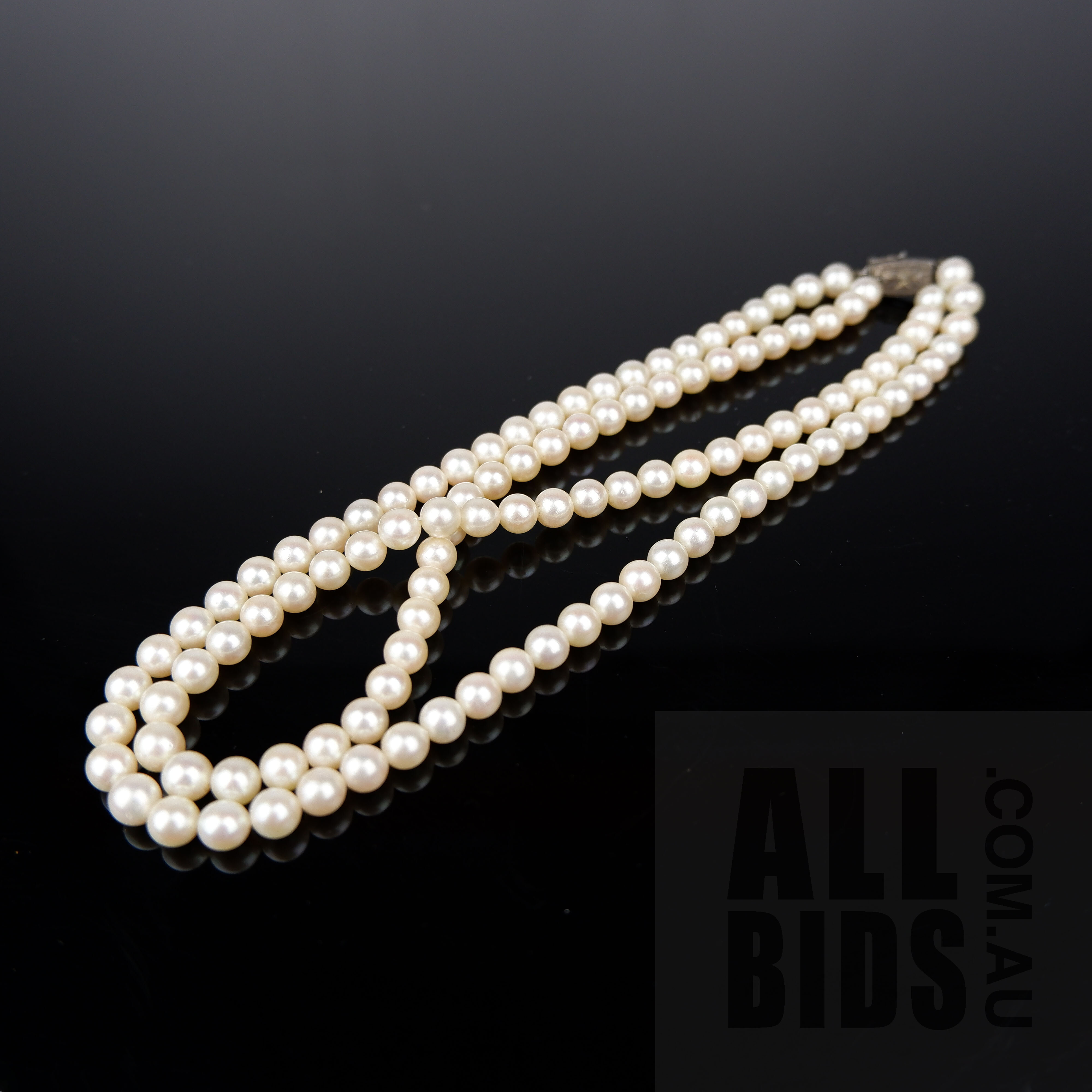 'Double Strand of Akoya Type Cultured Pearls with Sterling Silver Clasp, Very High Lustre'