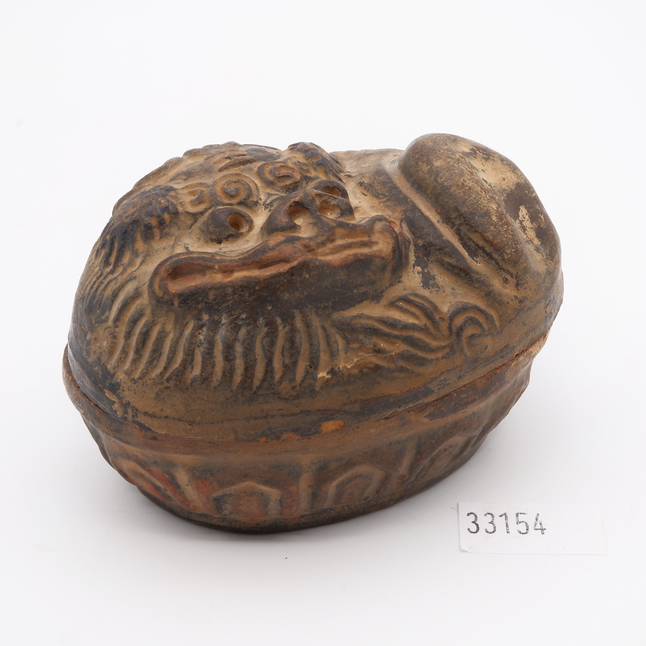 'Japanese Bizen Ware Red Pottery Incense Case (Kogo) Moulded with a Shishi Above Lotus Lappets'