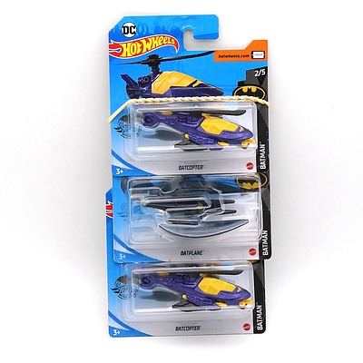 Three Boxed Hot Wheels Batman Model Cars, Including Batcopter and Batplane