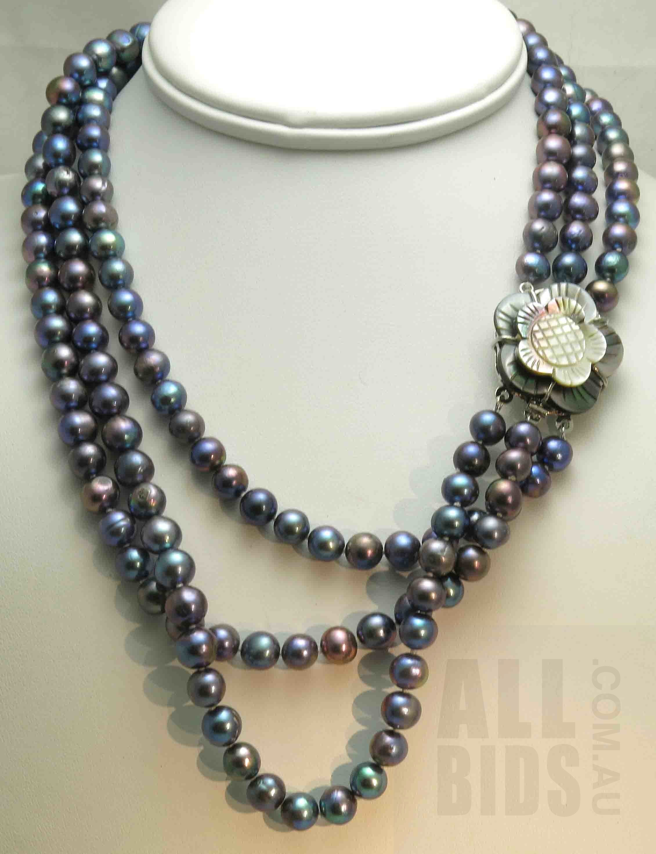 triple strand black pearl necklace