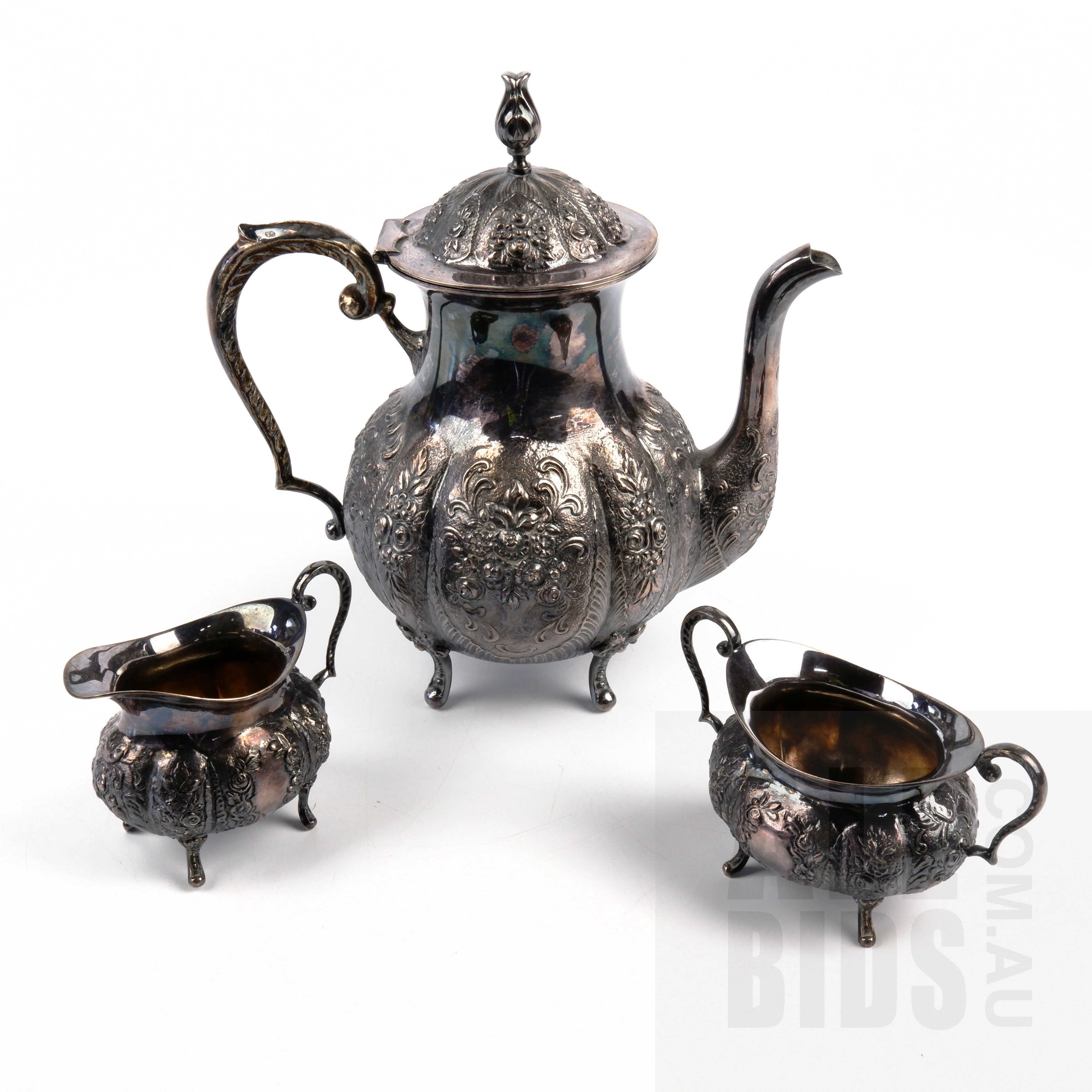 'Finnish Heavily Repoussed .830 Silver Teapot with Matched Creamer Jig and Sugar Bowl, Kultakeskus, 1982, 757g'