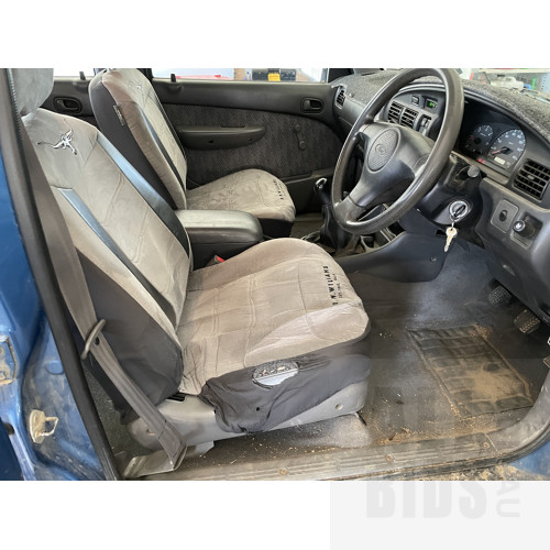1/2000 Ford Courier XL (4x4) PE Crew Cab P/up Blue 2.5L