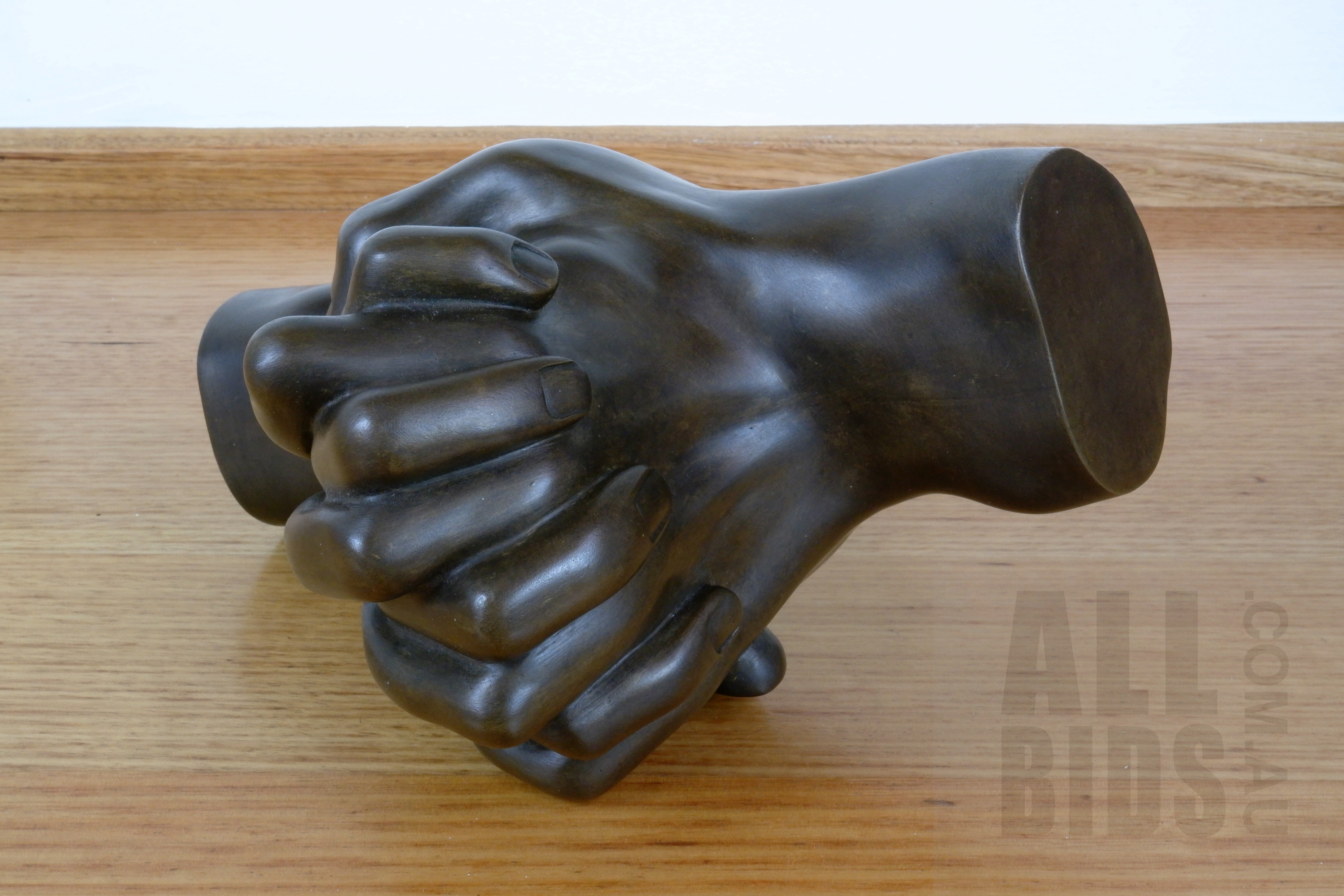 'Patinated Cast Metal Sculpture of Gripping Hands'