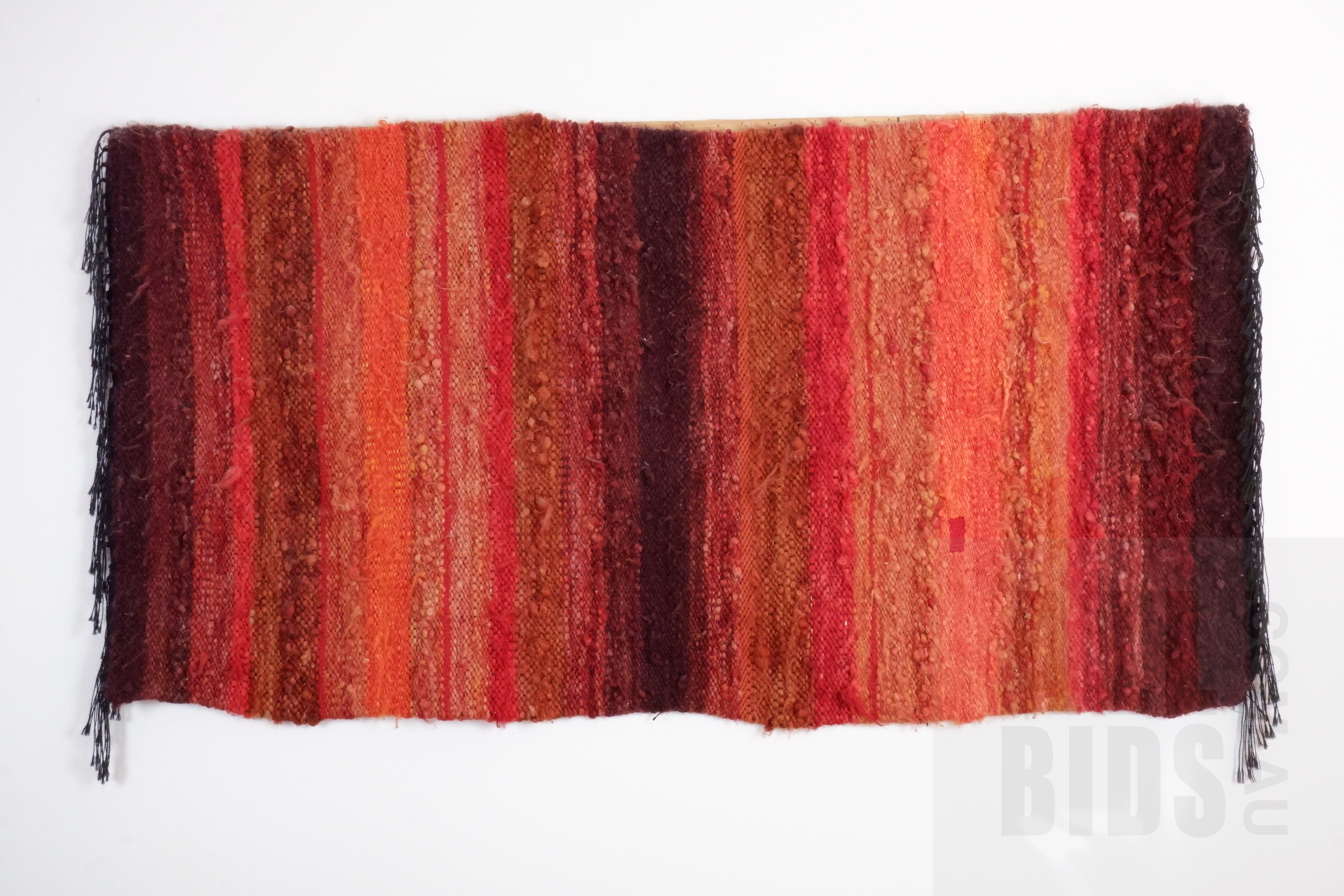 'A Woven and Tufted Wool Wall Hanging, 165 x 87 cm'