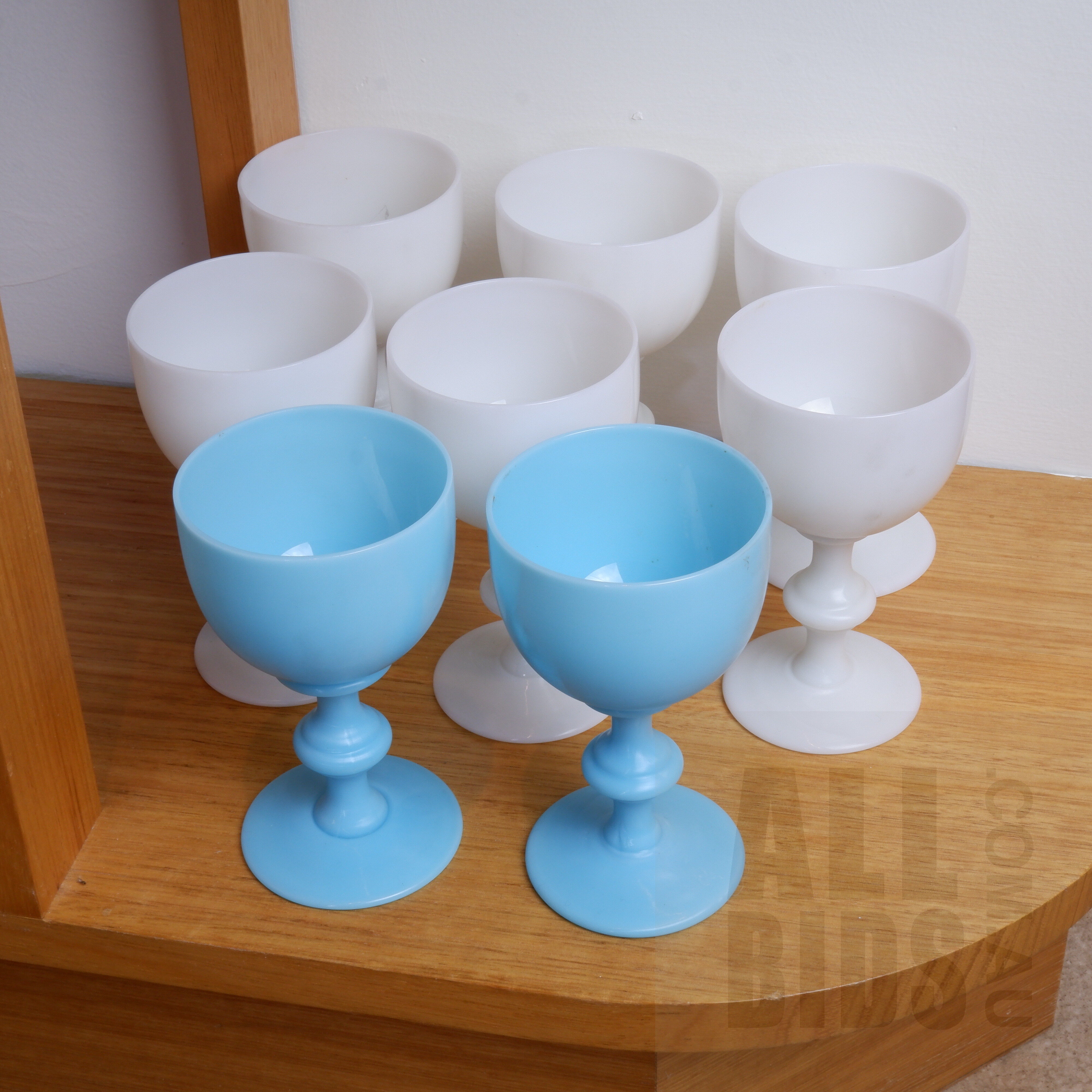 'Eight Antique Milk and Blue Glass Goblets'