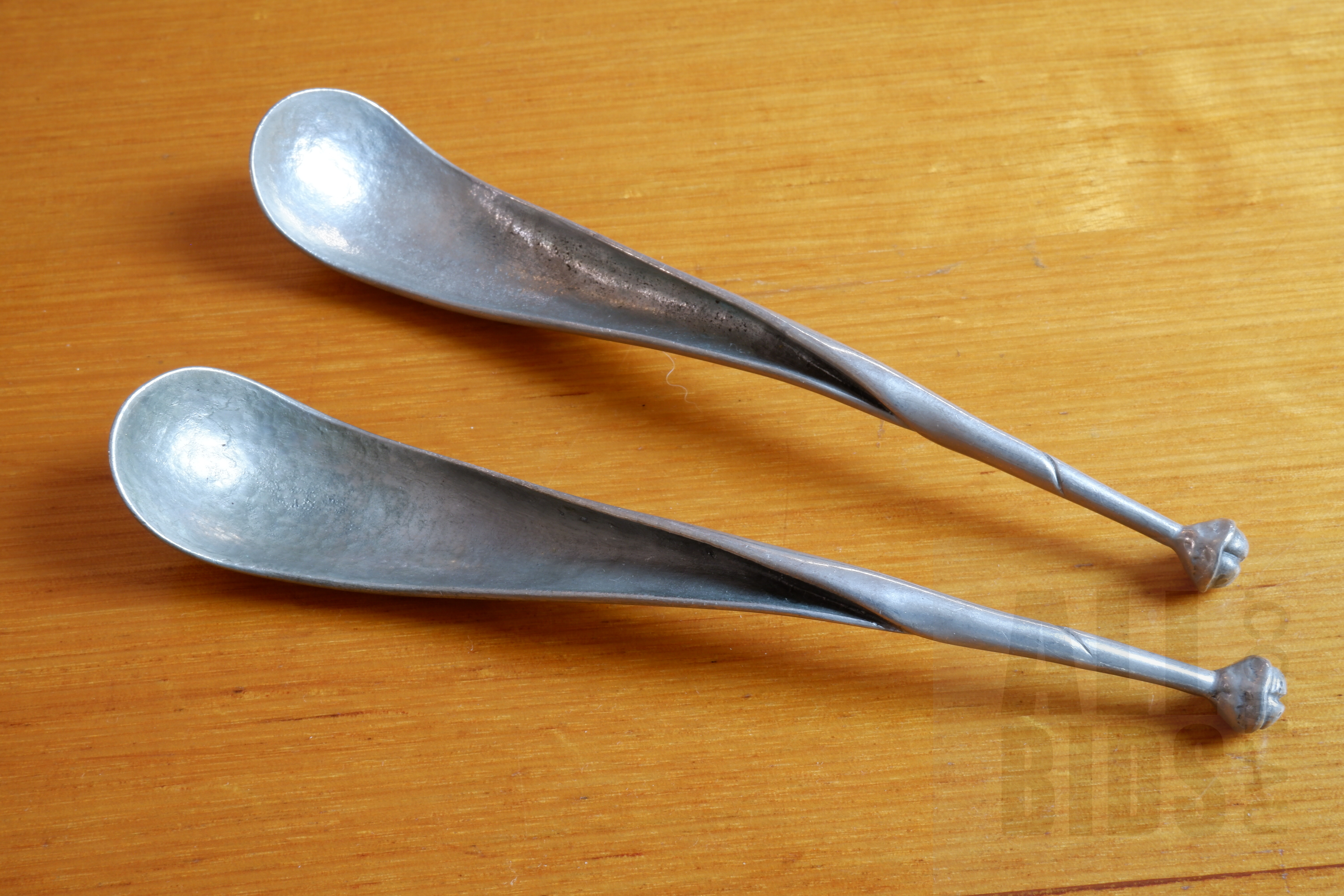 'Pair of Artesia Pewter Sugar Spoons'