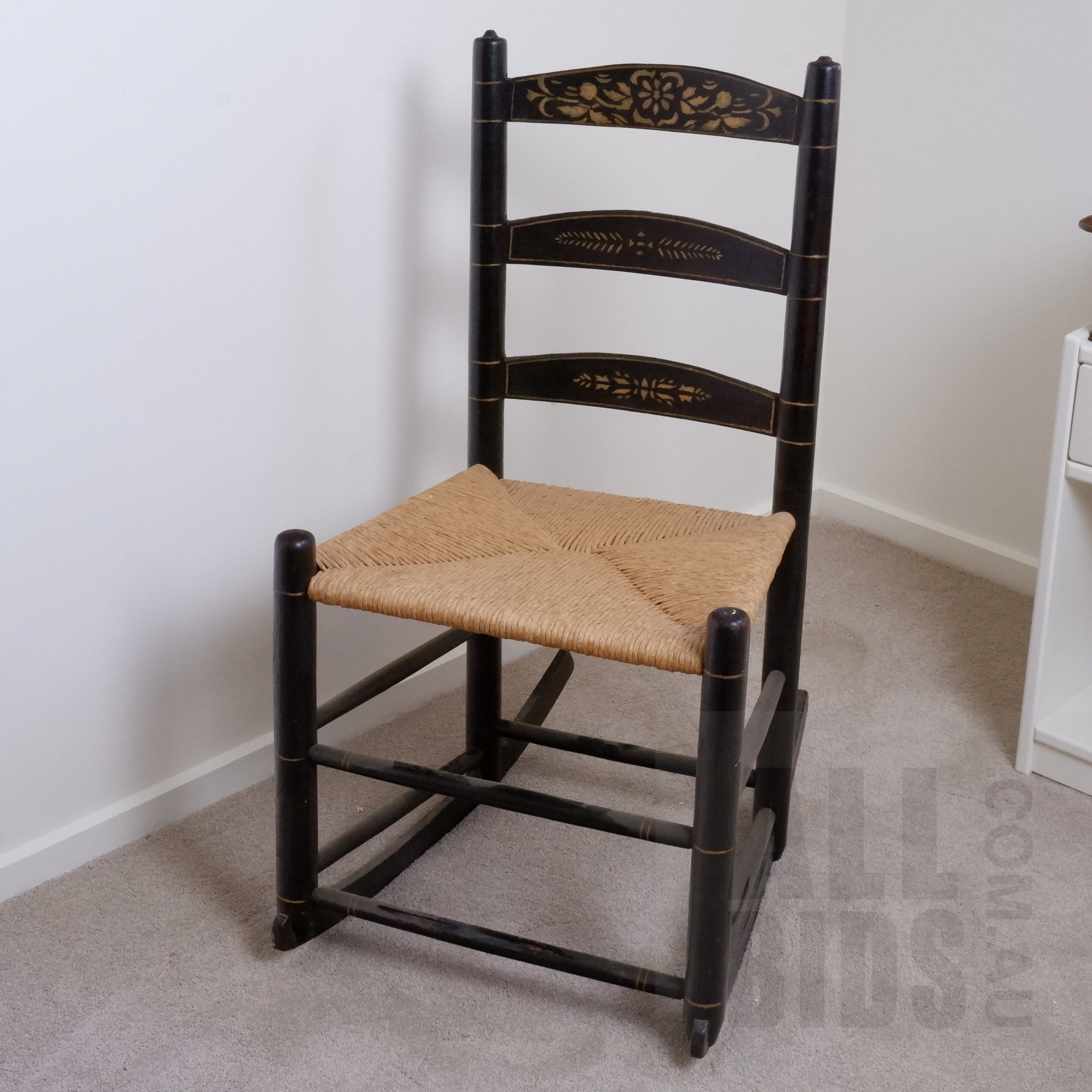 'Antique Ebonized Rocking Chair with Rattan Seat, Early 20th Century'