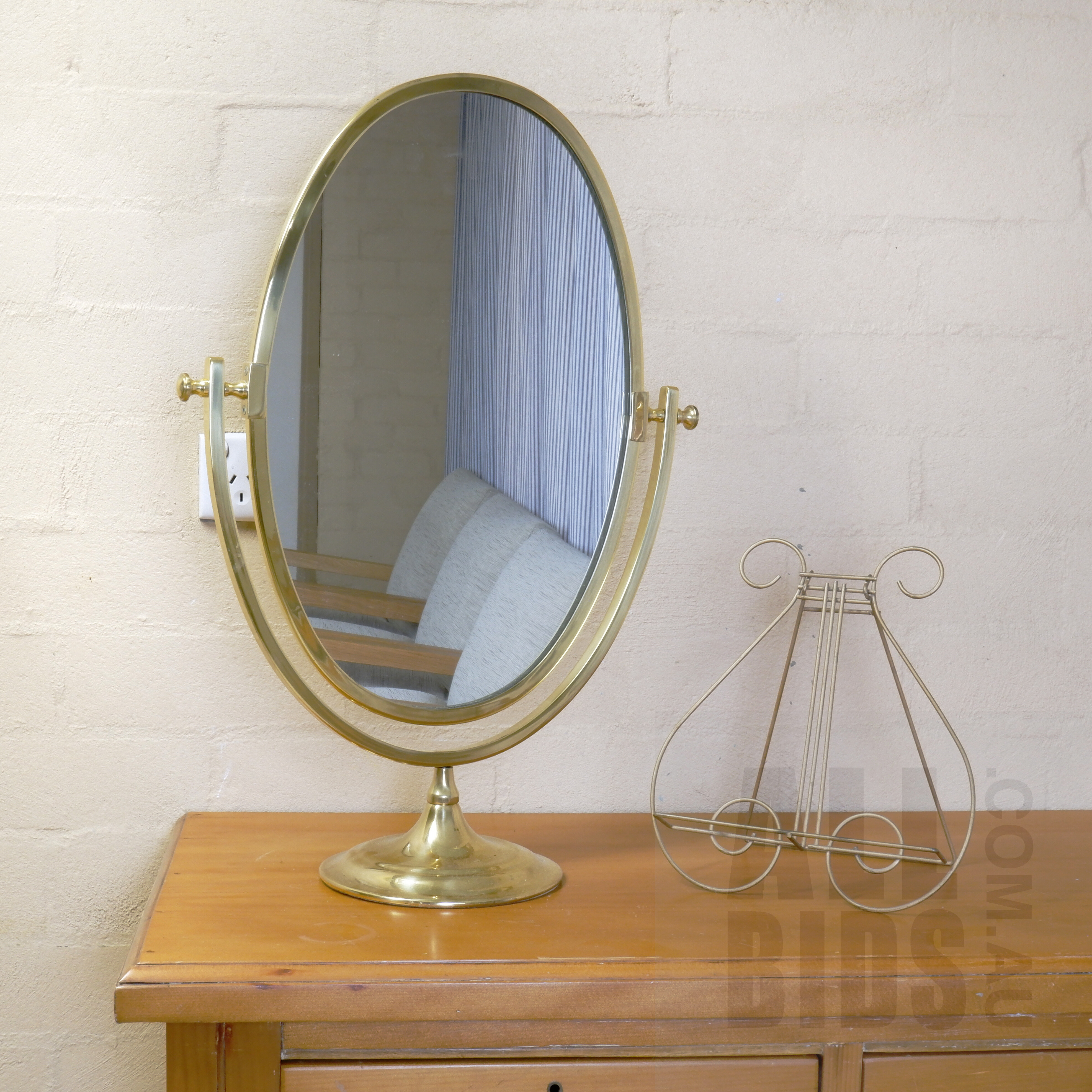 'Large Brass Coloured Oval Mirror with Lyre Form Book Stand'