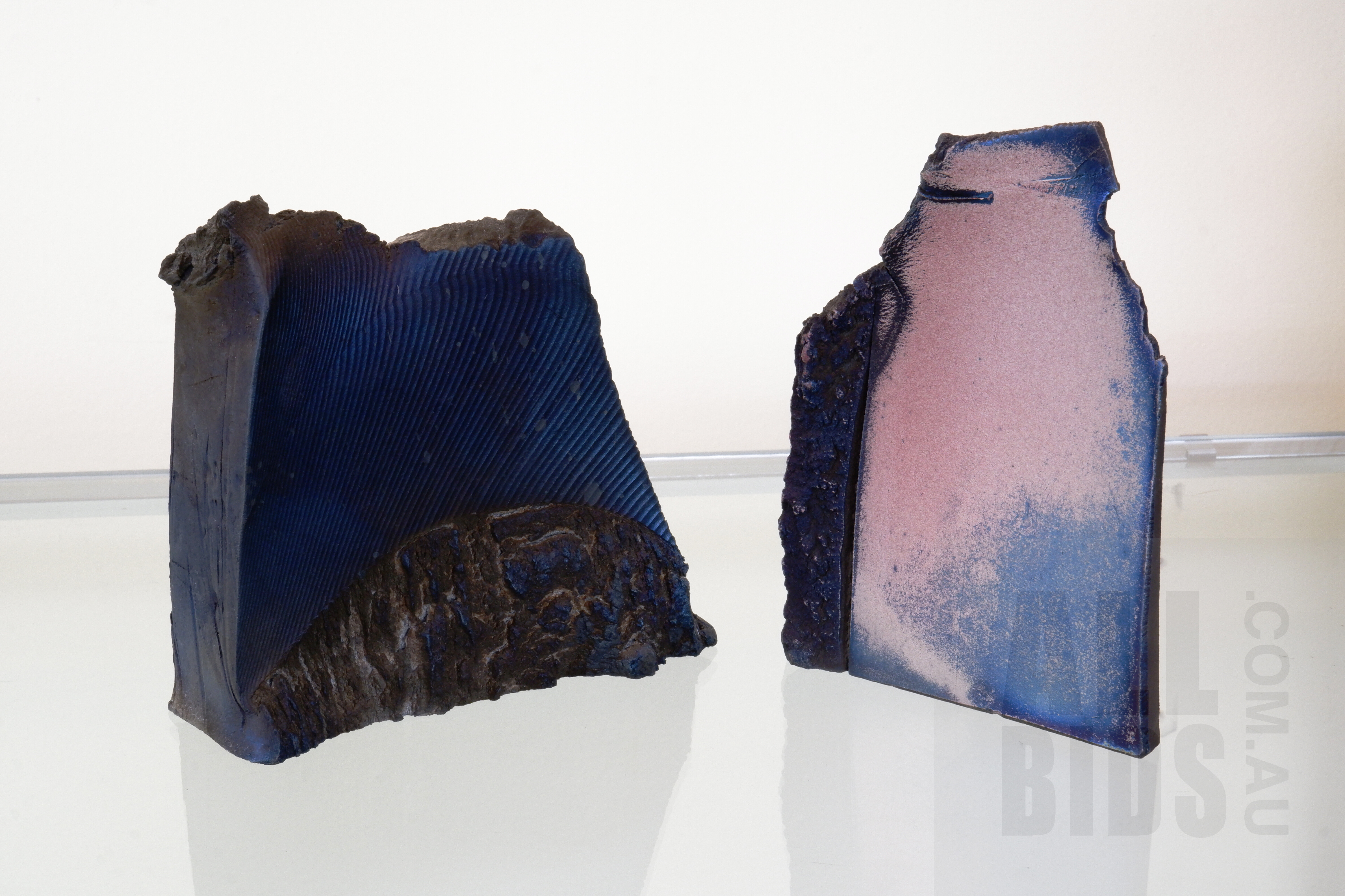 'Alan Watt (1941-)Two Black Fired Earthenware Forms with Terra Sigillata and Copper Soda Fuming, 2004'