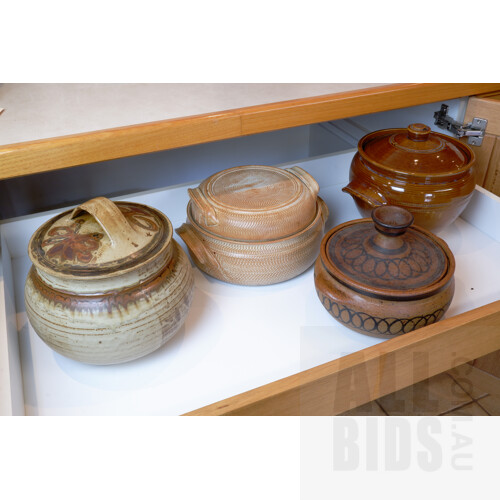 Three Studio Ceramic Covered Dishes and a Glazed Stoneware Bread Crock