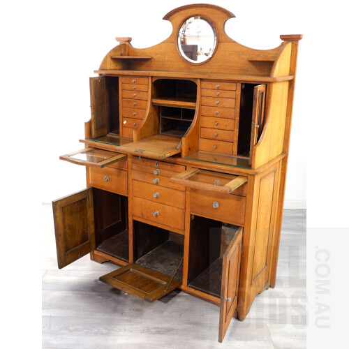 Early 20th Century Oak Dentist Cabinet with Custom Tool Drawers, Beveled Glass Mirrors and Metal Lined Drawer