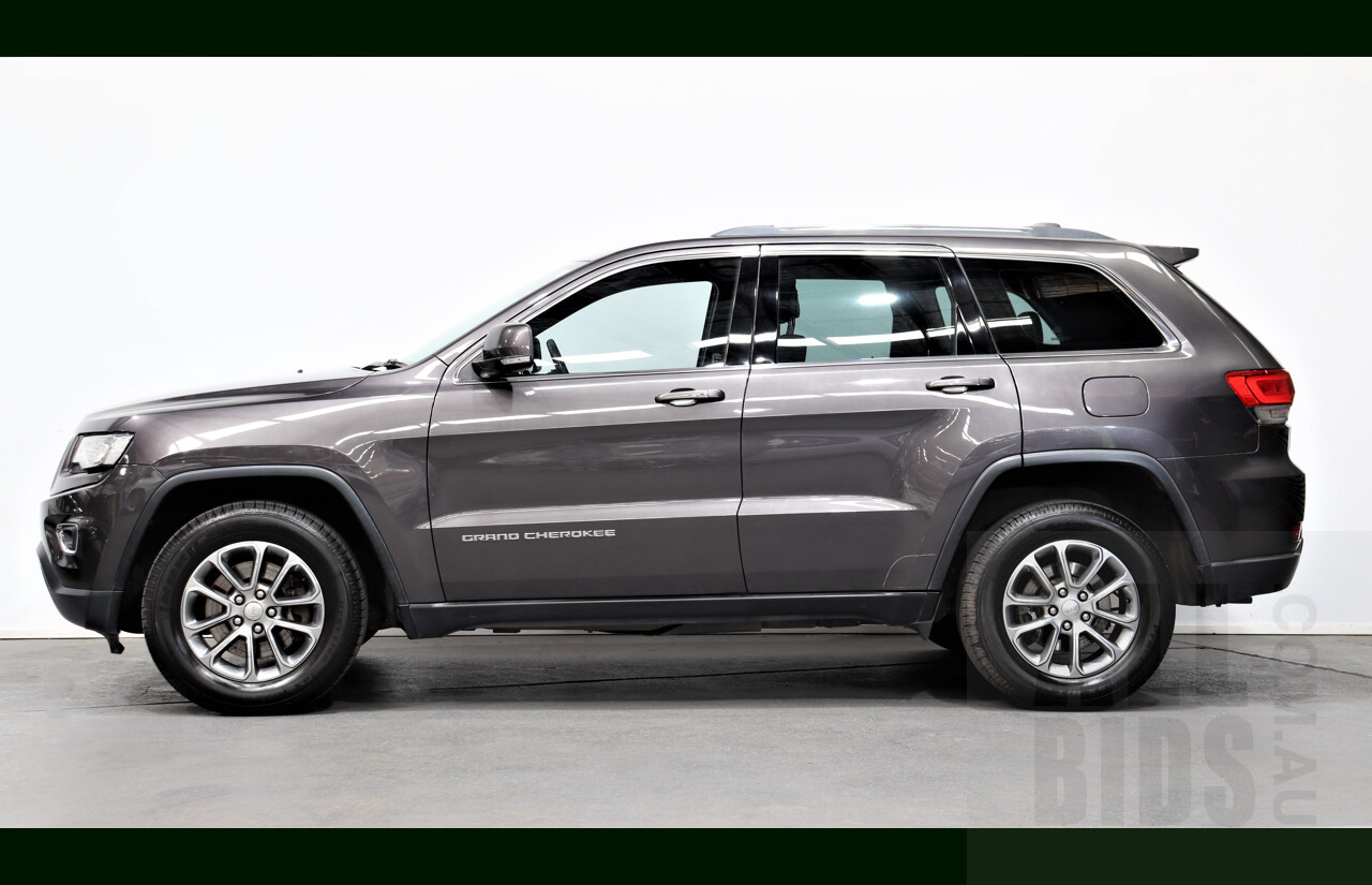 4/2014 Jeep Grand Cherokee Laredo - Lot 1357793 | CARBIDS