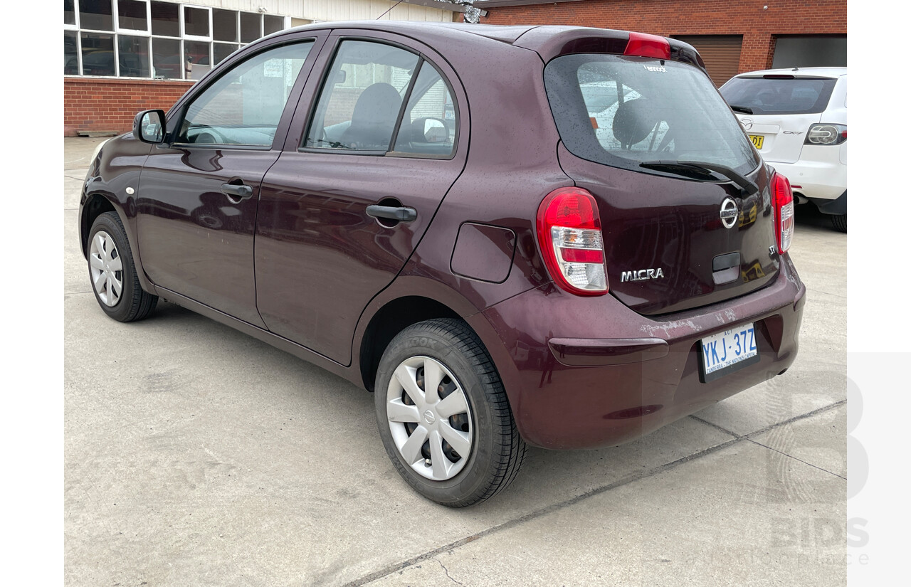 maroon nissan micra