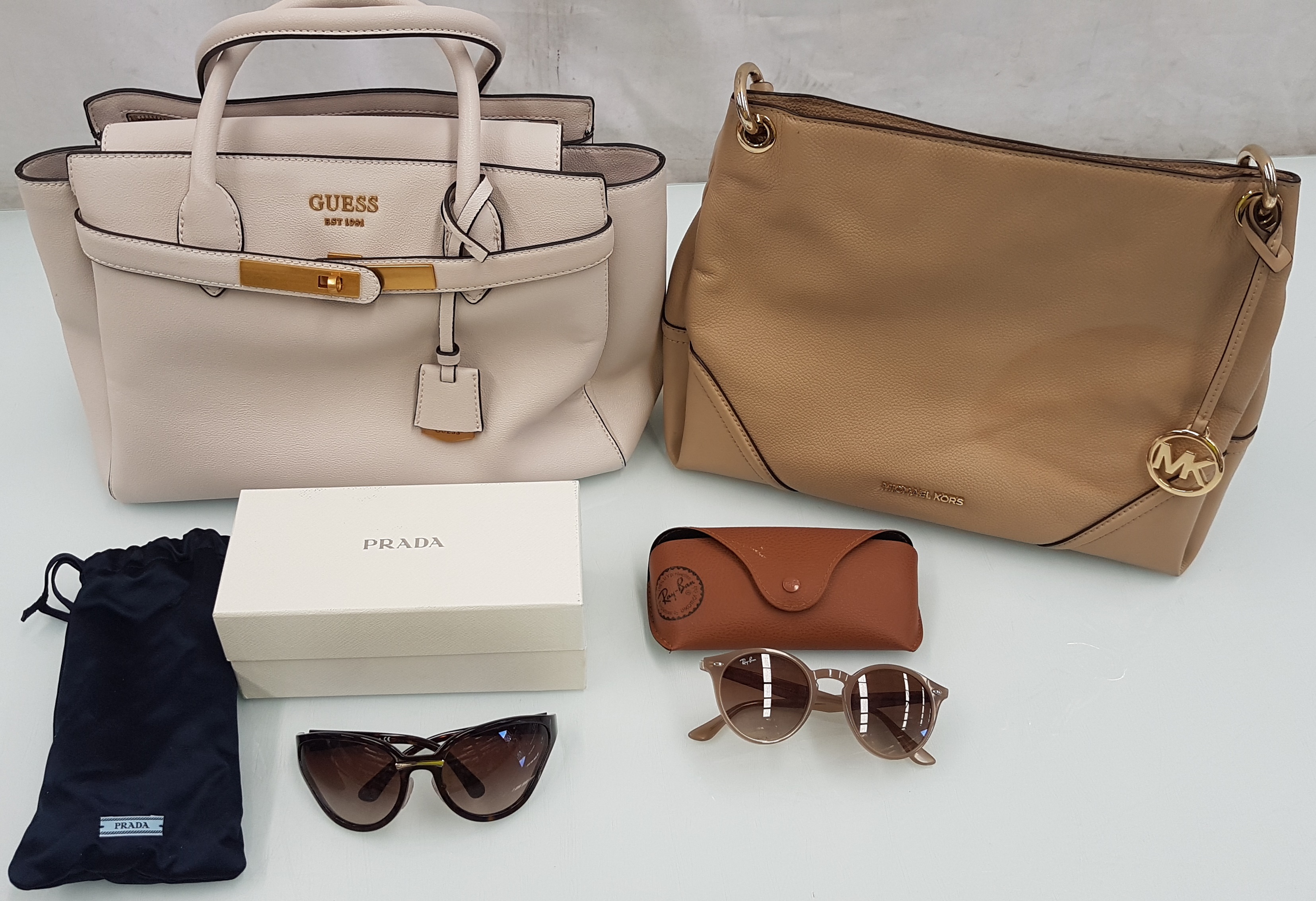 Prada Ray Ban Sunglasses and Guess - Lot 1436601 | ALLBIDS