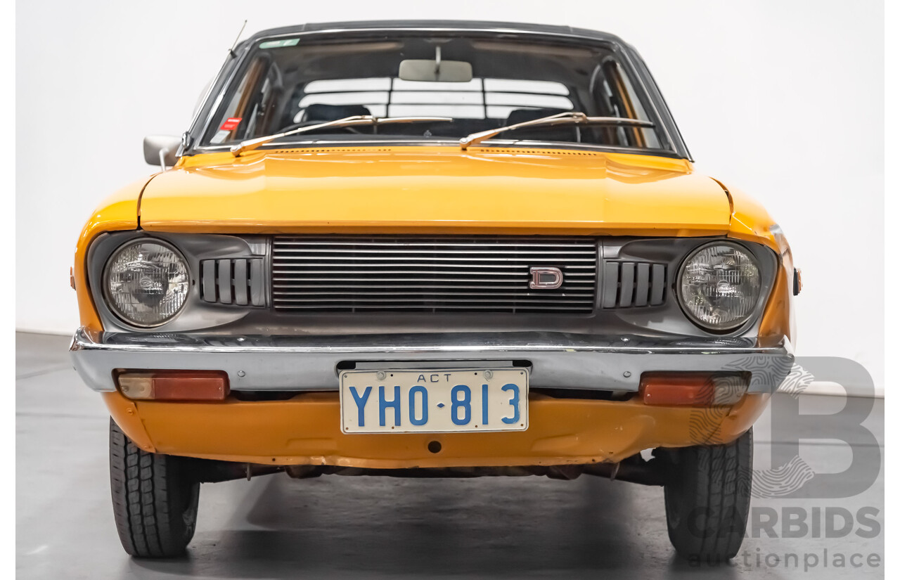 orange datsun 120y